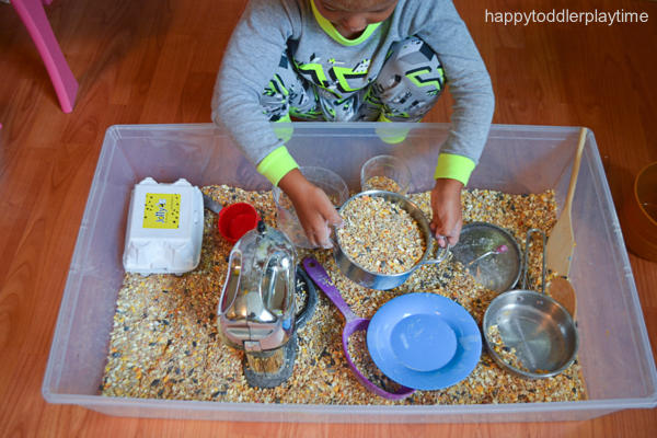 birdseed kitchen sensory bin for toddlers and preschoolers 