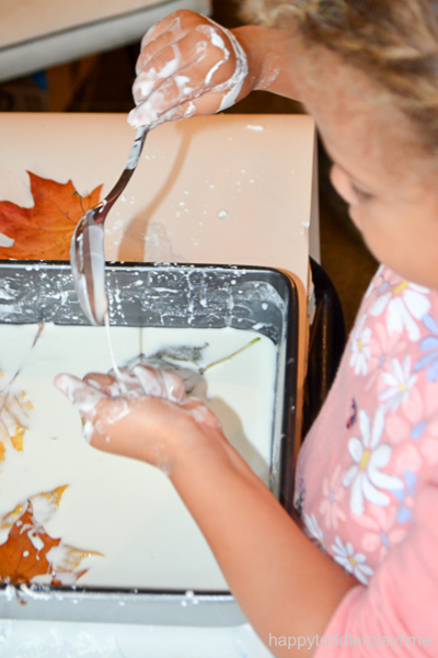 Create a fun and messy Fall sensory play activity using oobleck and freshly fallen leaves. It's super easy sensory activity for toddlers & preschoolers!