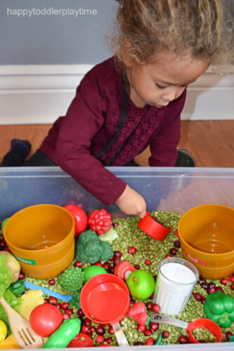 Christmas Kitchen Sensory Bin - Happy Toddler Playtime
