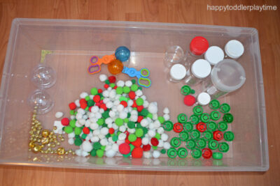 Christmas Pom Pom Sensory Bin - Happy Toddler Playtime