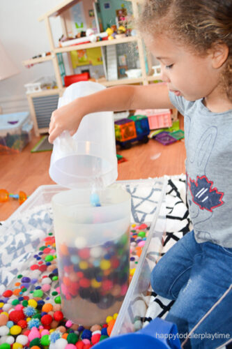 Pom Pom Water Sensory Bin - Happy Toddler Playtime
