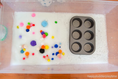 Pom Pom Bubble Foam Sensory Bin - Happy Toddler Playtime