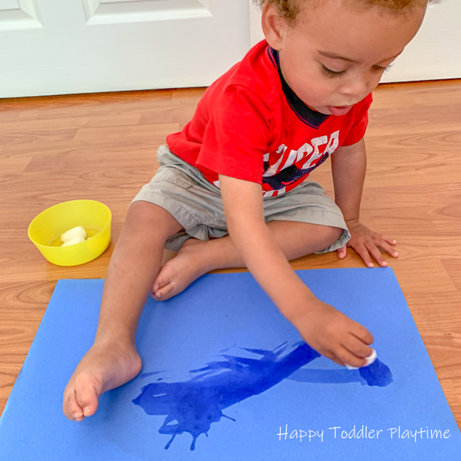 Painting with cotton balls and water for toddlers