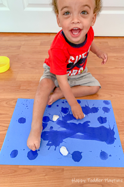 Painting with cotton balls and water for toddlers