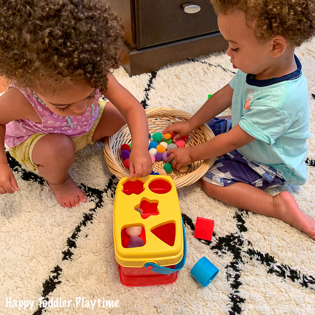 Sorting Pom-poms by Size Activity - Toddler at Play