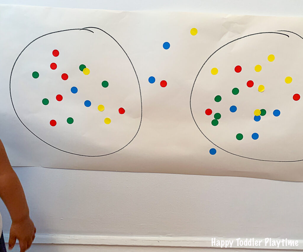 Fine motor game using dot stickers for toddlers