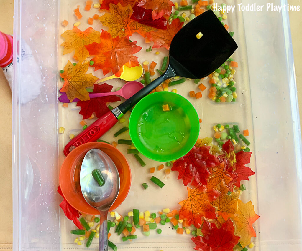 a fun and colourful sensory bin for toddlers and preschooler for this fall
