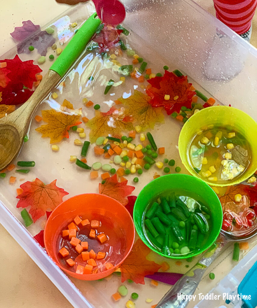 a fun and colourful sensory bin for toddlers and preschooler for this fall
