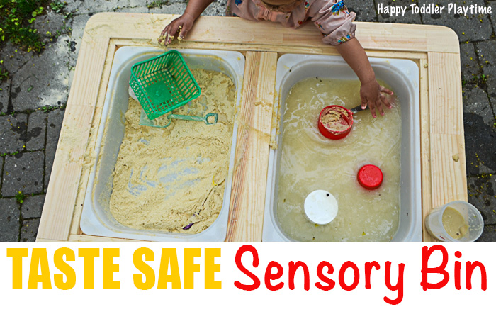 toddlers playing in baby safe sensory bin