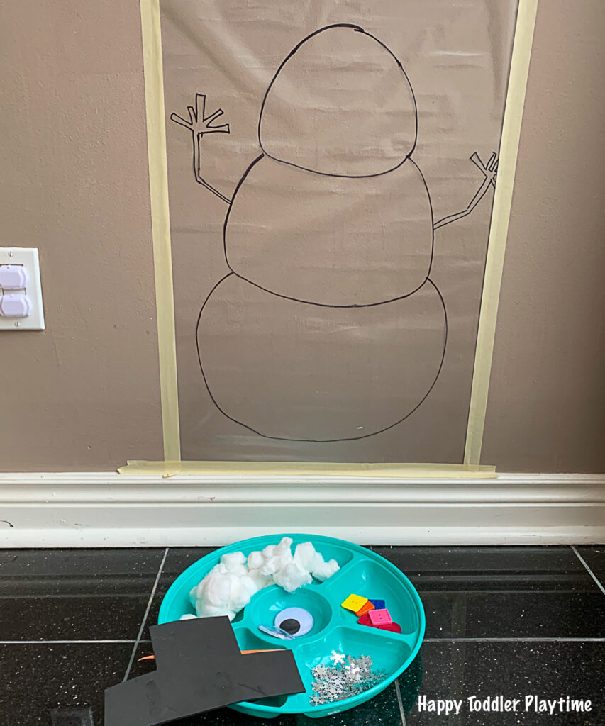 Snowman sticky wall Christmas and winter activity for toddlers 