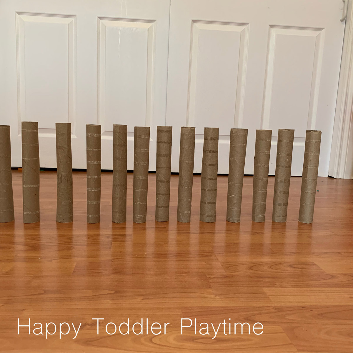Domino Super Rollo Paper Towel Roll Domino Challenge - Happy Toddler Playtime