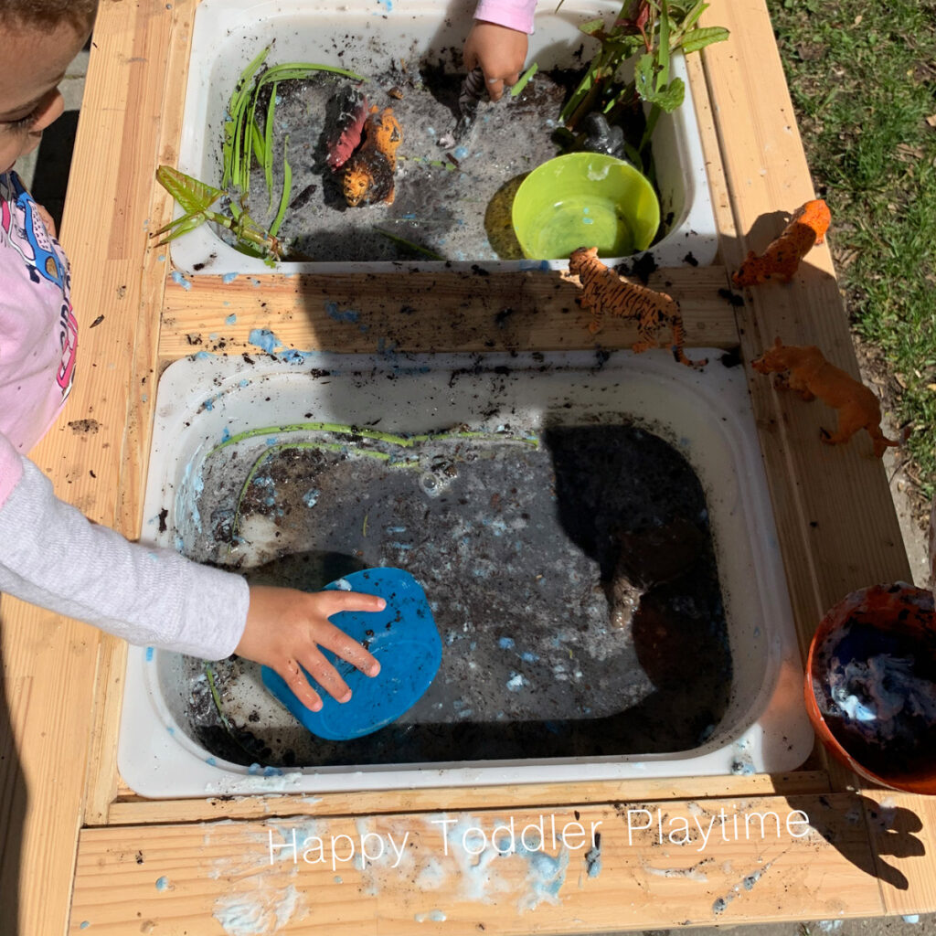 muddy zoo sensory bin for toddlers and preschoolers