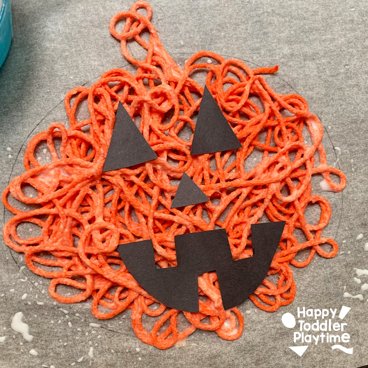 Scribble Yarn Pumpkin Craft for Kids - Happy Toddler Playtime